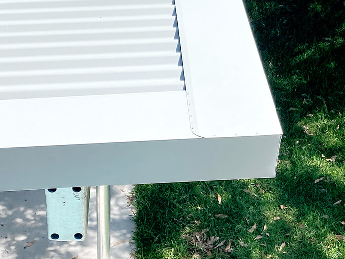 A very neatly constructed corner on a new roof